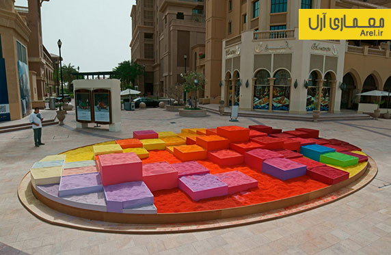 استفاده از 30 تن ماسه رنگی برای طراحی المان شهری در دوهه